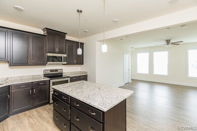 KITCHEN W/ GRANITE, SS APPLIANCES, PENDANT LIGHTS,