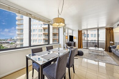 Bright and airy view of the dining and living area