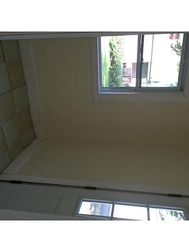 Mud Room. REAR  ENTRANCE TILED MUD ROOM