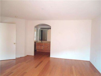 Master bedroom, bathroom through the arch to the r