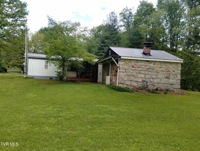 Rear view of house, storage