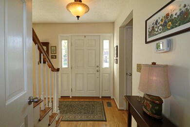 Foyer with hardwood floor