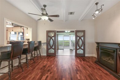 Bar opens to kitchen!  The dining room opens to th
