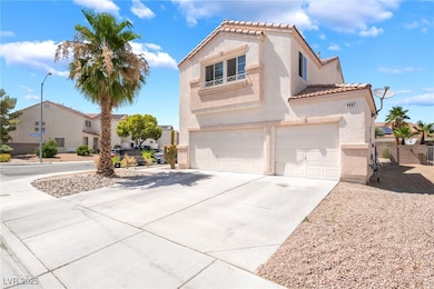 Mediterranean / spanish house featuring a garage,