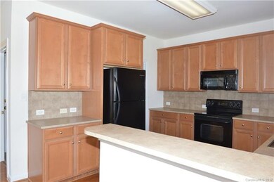 Another view of the kitchen.  The pantry to the ri