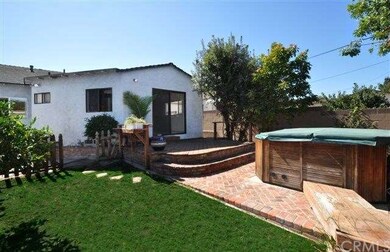 The master bedroom opens to a spacious deck and into the backyard with an abundance of fruit trees and a spa for relaxation and enjoyment.
