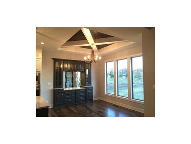 Breakfast Room with built-in hutch accented by dia