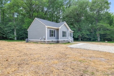 View of home's exterior featuring crawl space, cen