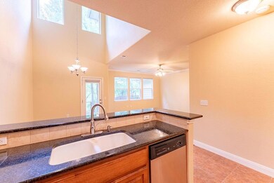 Kitchen featuring stainless steel dishwasher, a s