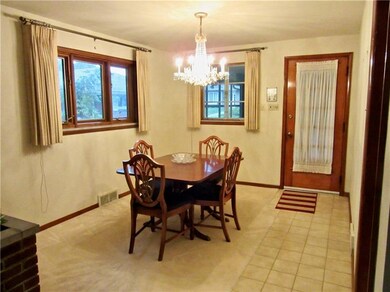 Door in dining room accesses porch/breezeway.  Doo
