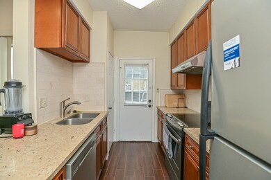Granite countertops and Stainless steel appliances