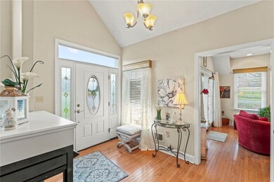 Note the vaulted ceiling in the large entryway, be