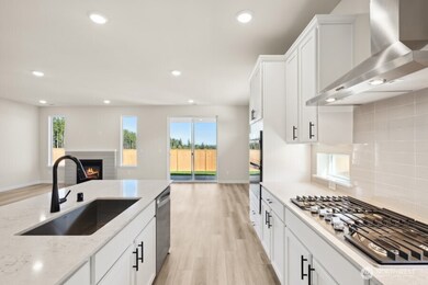 Photos are a completed home of the same floorplan.