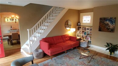 Staircase to second floor. Neutral color palette t