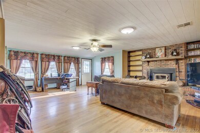 Living room has an abundance of natural light.