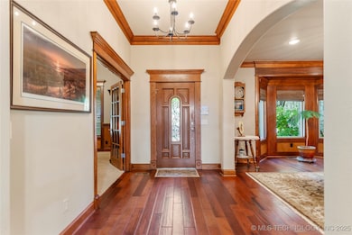 Gorgeous entryway with ornate crown molding