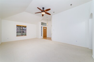 This spacious room features high ceiling, plush ca