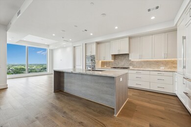 The state-of-the-art kitchen overlooks the formal