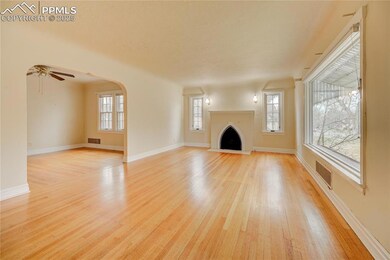 Unfurnished living room featuring visible vents, c