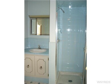 Bathroom. off garage entry and mudroom. Perfect fo