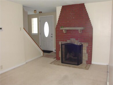 CERAMIC ENTRY * LIVING RM W/WOODBURNING FIREPLACE
