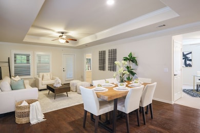 View from the entry, overlooking dining area and living room
