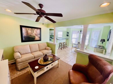 Living room with recessed lighting, baseboards, cr