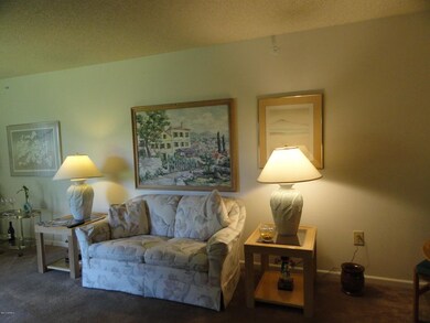 Living room with lots of wall space