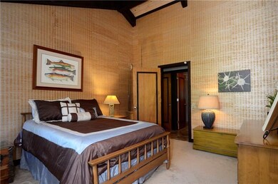 Bedroom: This larger bedroom is across from the fu