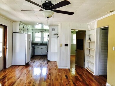 View of the entry from the back door into kitchen 