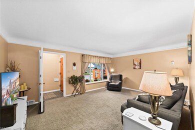 Additional view of Living Room and Foyer.