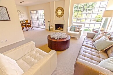 Living room area (foreground) and dining room off 