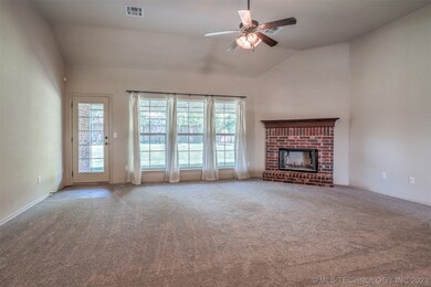 Living with vaulted ceiling and wood burning firep