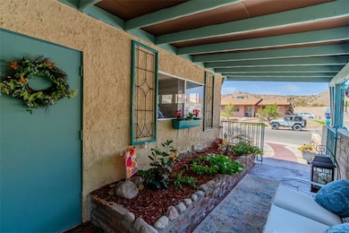 View of patio with covered porch