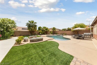 Backyard w/synthetic grass, wood burning custom fi