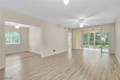 Unfurnished room featuring ceiling fan, light wood