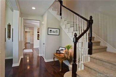 Stairs leading to three bedrooms and top of the li