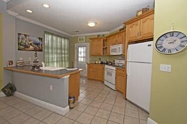 kitchen with door to second balcony