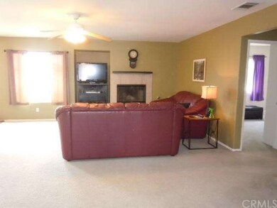 Open floor plan with neutral carpet, designer pain
