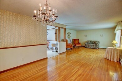 Elegant 11 x 10 formal Dining Rm w/chair rail acce