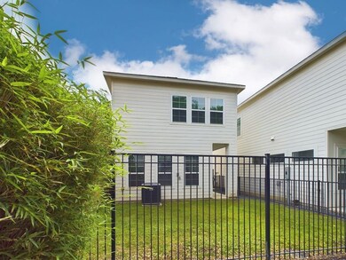 Exterior view of the house and the back yard from