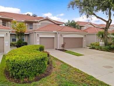 Mediterranean / spanish-style house featuring a ga