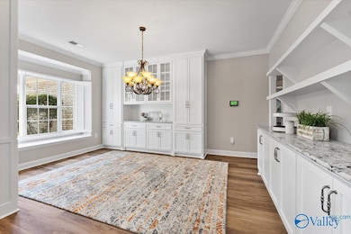 Custom wood cabinets, wine cabinet and bar.