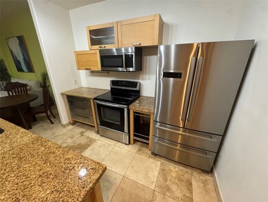 Kitchen includes recent Bosch refrigerator, microw
