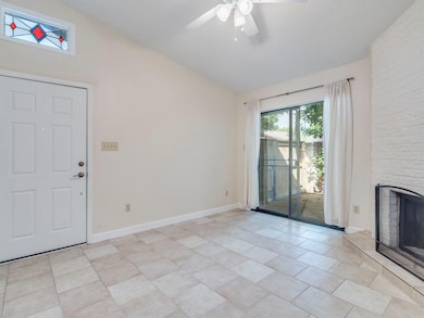 Unfurnished living room featuring lofted ceiling,