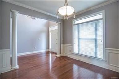 Hardwood in the foyer and formal dining area