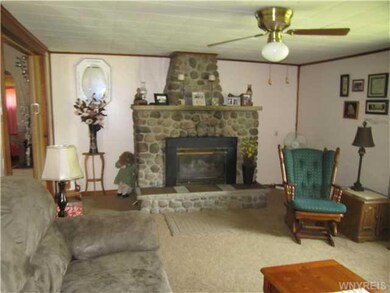 Living Room Living rm showing gas fireplace built 