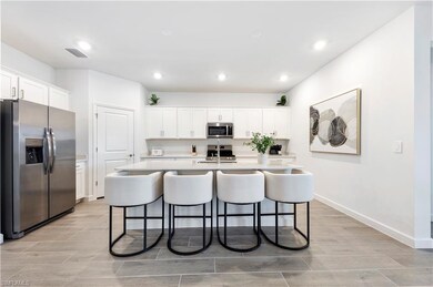 Kitchen featuring appliances with stainless steel 