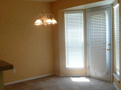 Breakfast/dining area, door to back yard. Picture 