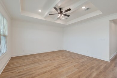 With recessed lighting, tray ceilings, and a flexi